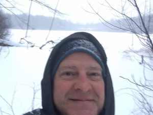 Photo of Kurt Ruehr hiking in winter