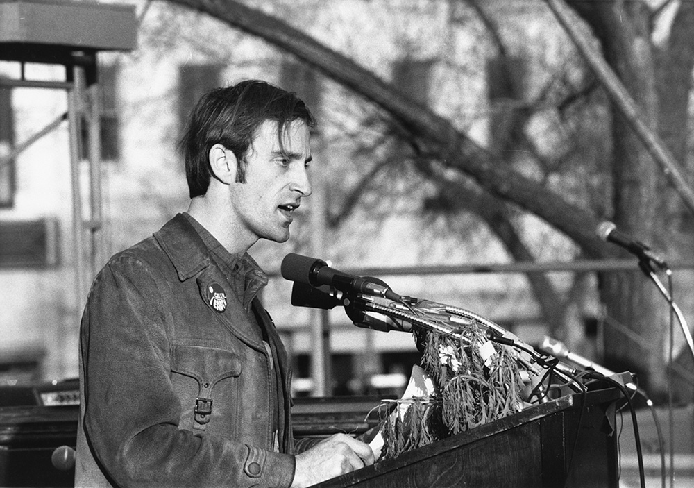 Photo of Denis Hayes speaking to an Earth Day crowd in 1970