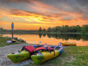 Ohio Parks and Recreation Association photo of kayaks by water at sunset